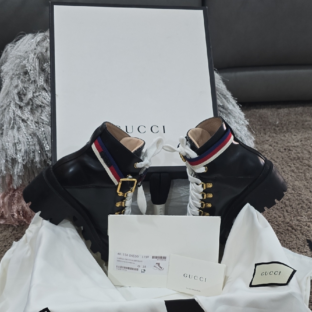 Gucci Black Leather Combat Boots with Gold Accents